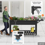 Folding potting bench table with ergonomic design features and man using it outdoors.